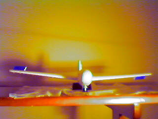 The right aileron is up and the left aileron is down