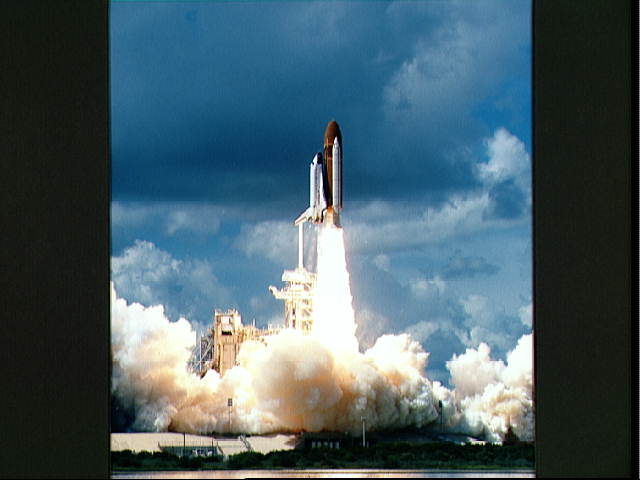 Photo of launch of the Space Shuttle Atlantis.