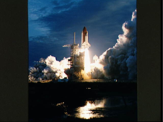 Photo of launch of Space Shuttle.