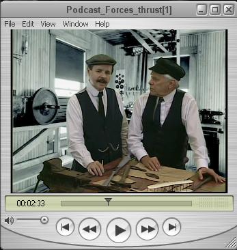 Photo of Wilbur and Orville Wright talking in their shop.